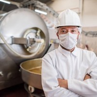 man working at a food factory - food stock pictures, royalty-free photos & images