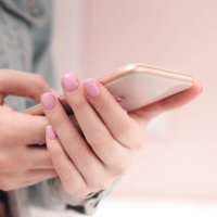 manicure - beauty treatment photo of nice manicured woman fingernails. very nice feminine nail art with nice red, white and black nail polish. processed in retro colors. selective focus. - nails art photos et images de collec
