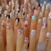 mannequin hands display different types of nail art - nails art stock pictures, royalty-free photos & images