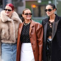 Marianne Theodorsen, Janka Polliani and Darja Barannik are posing, outside The Garment, during the Copenhagen Fashion Week AW24 on January 31, 2024...