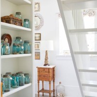 mason jars arranged on shelves in living room at cottage - home decoration stock pictures, royalty-free photos & images