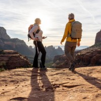 mature couple hike through desert landscape - travel stock pictures, royalty-free photos & images