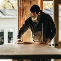 mature man working on home improvement project in garage - home decoration stock pictures, royalty-free photos & images