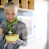 mature woman having healthy breakfast - food stock pictures, royalty-free photos & images