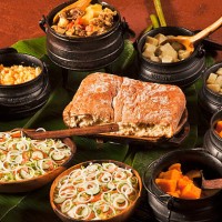 meal served in traditional 3-legged cast iron pots - food stock pictures, royalty-free photos & images