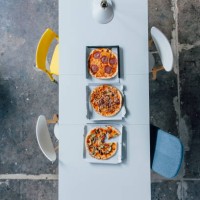 meeting table with pizza - junk food stock pictures, royalty-free photos & images