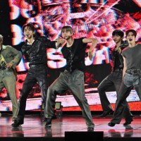 Members of K-pop boy group RIIZE perform during a showcase for their first mini album 