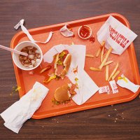 messy tray with eaten hot dog, fries and cola - junk food stock pictures, royalty-free photos & images