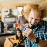 metal male singer screaming at the microphone - concert stock pictures, royalty-free photos & images