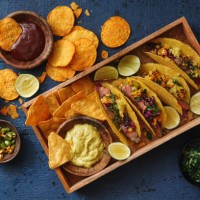 mexican crunchy taco shells with beef and vegetables - junk food stock pictures, royalty-free photos & images
