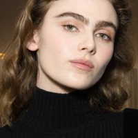 Mia Armstrong poses in backstage at the Max Mara fashion show during the Milan Fashion Week - Womenswear Fall/Winter 2025/2026 on February 26, 2025...