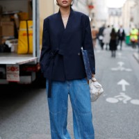Mia Kong wears blue blazer, light blue baggy jeans, black loafers, outside Kenzo, during the Womenswear Fall/Winter 2025/2026 as part of Paris...