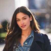 Michelle Ivana wears gold necklace, navy blue half buttoned denim jean jacket, outside Coach, during the New York Fashion week Fall/Winter 2025 on...
