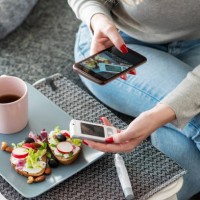 mid adult diabetic woman having breakfast at home - food stock pictures, royalty-free photos & images