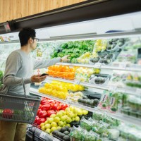 mid adult male buying grocery in supermarket - food stock pictures, royalty-free photos & images