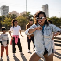 mid adult woman dancing reggaeton during street party outdoors - concert stock pictures, royalty-free photos & images