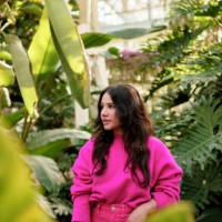 mid waist portrait of caucasian young woman with pink clothes in nature background - fashion stock pictures, royalty-free photos & images