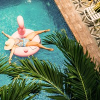 middle age woman swimming in the pool with inflatable swim ring - travel stock pictures, royalty-free photos & images