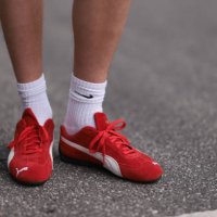 Mike Bjørnbak is seen wearing white socks from Nike, and “Speedcat“ sneakers in red suede from Puma before the Gestuz Show during the Copenhagen...