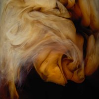milk mixing into coffee - coffee stockfoto's en -beelden