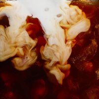 milk pour into iced coffee - coffee stock pictures, royalty-free photos & images