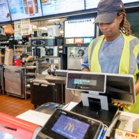 Mims, Florida, McDonald's Fast food restaurant inside cashier and checkout counter.