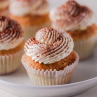 mini tiramisu cupcakes with cocoa dusting - junk food stock pictures, royalty-free photos & images