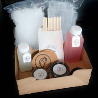 Mixed drinks to go, including a margarita, left, and a cosmopolitan with crushed ice, ice cubes, straws, salt, limes and coasters served at Chickadee...