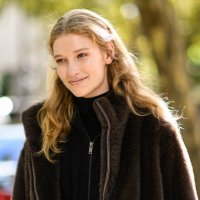 Model Apolline Rocco Fohrer is seen wearing a black jacket, black sweater outside the Miu Miu show during Womenswear Spring/Summer 2025 as part of...