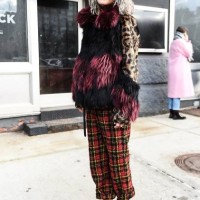 Model Chloe Norgaard is seen wearing an animal print fur coat with plaid pants outside of the 3.1 Phillip Lim show during New York Fashion Week:...