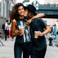 Model couple Imaan Hammam and Naleye Junior outside Blue Bottle Coffee at Milk Studios on September 12, 2015 in New York City.