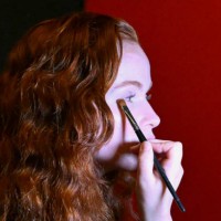 Model gets made-up in backstage prior to the Max Mara collection show as part of the Milan Fashion Week Womenswear Autumn/Winter 2025/2026 in Milan...