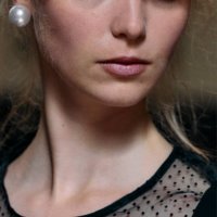 Model gets ready backstage ahead of the Bora Aksu Spring/Summer 2025 collection, at London Fashion Week in London, on September 13, 2024.