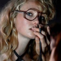 Model gets ready backstage ahead of the MASHA POPOVA Spring/Summer 2025 collection at London Fashion Week in London on September 14, 2024.