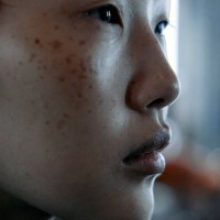 Model gets ready backstage ahead of the Richard Quinn Spring/Summer 2025 collection at London Fashion Week in London on September 14, 2024.