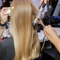 Model, hair detail, backstage ahead of the Tom Ford fashion show during the Milan Fashion Week Womenswear Spring/Summer 2024 on September 21, 2023 in...