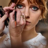 Model has hair and make up prepared backstage, ahead of the Bora Aksu Spring/Summer 2025 collection, at London Fashion Week in London, on September...
