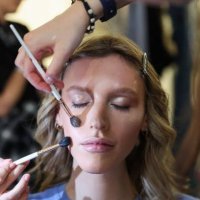Model is being styled backstage ahead of the Ewa Herzog show during Berlin Fashion Week SS25 at Koenig Galerie on July 02, 2024 in Berlin, Germany.