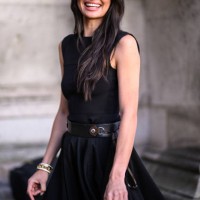 Model Kelsey Merritt is seen wearing a black Louis Vuitton dress, black belt and Louis Vuitton handbag outside the Louis Vuitton show during...