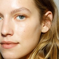 Model, make up detail, poses backstage at the Ermanno Scervino Fashion Show during the Milan Fashion Week Womenswear Spring/Summer 2023 on September...