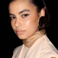 Model poses backstage ahead of the Carla Zampatti Presented by Porsche show during Australian Fashion Week Presented By Pandora 2024 at Carriageworks...