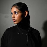 Model poses backstage ahead of the David Jones Indigenous Fashion Projects show during Australian Fashion Week Presented By Pandora 2024 at...