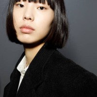 Model poses backstage at the Jil Sander fashion show during the Milan Fashion Week Womenswear Fall/Winter 2023/2024 on February 24, 2023 in Milan,...