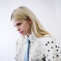 Model poses backstage prior to the Vivienne Westwood Womenswear Fall/Winter 2025-2026 show as part of Paris Fashion Week at Pavillon Cambon on March...