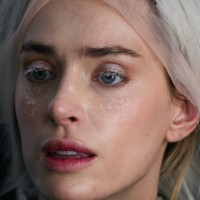 Model poses for photos in the backstage before presenting a creation by Weinsanto for the Women Ready-to-wear Fall-Winter 2025/2026 collection as...