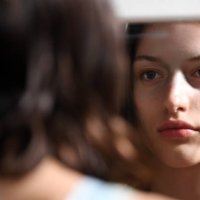 Model prepares backstage ahead of the ANNA QUAN presented by ebay show during Australian Fashion Week Presented By Pandora 2024 at Carriageworks on...
