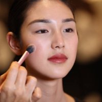 Model prepares backstage ahead of the Rory William Docherty show during Australian Fashion Week Presented By Pandora 2024 at Carriageworks on May 13,...