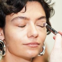 Model prepares backstage ahead of the Third Form show during Australian Fashion Week Presented By Pandora 2024 at Carriageworks on May 15, 2024 in...