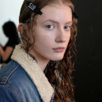 Model prepares backstage at the Juzui SS25 Collection fashion show during the September 2024 New York Fashion Week: The Shows at Canoe Studios on...