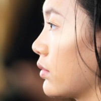 Model prepares backstage for 'Custo Barcelona' fashion show during Mercedes-Benz Madrid Fashion Week in Madrid, Spain. July 09, 2018.